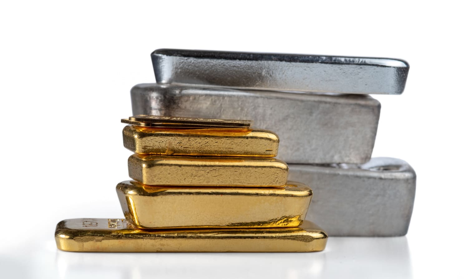 Gold and silver bars stacked on each other