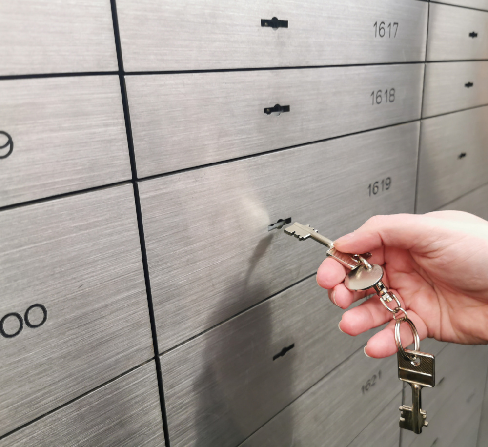 Lockers and a hand that is just opening a locker