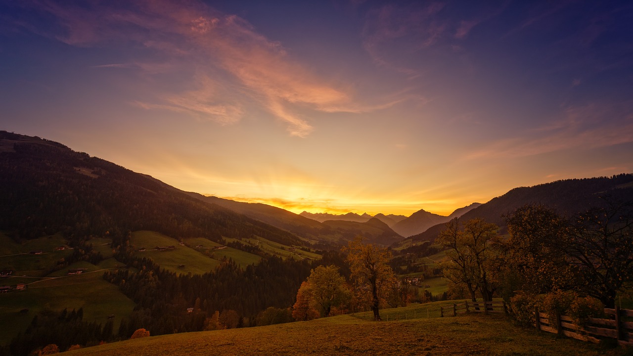 Sunset over the Alps as a sign of death